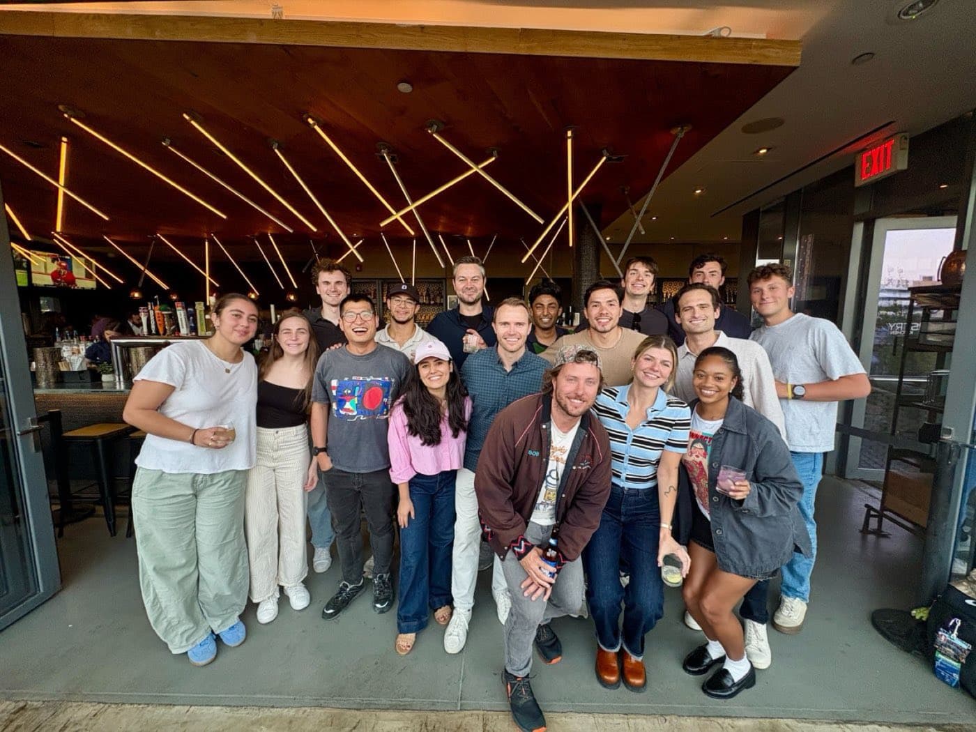 The Office Hours team together at a rooftop happy hour